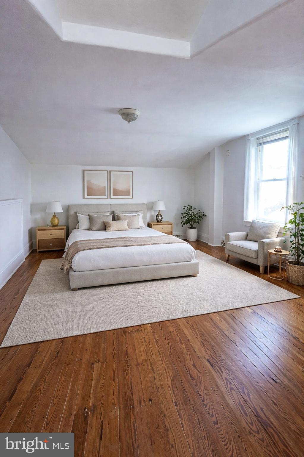 7611 Ridge Avenue, Unit 2 Philadelphia, PA 19128 - Photo 15 of 16 a bedroom with a bed and window