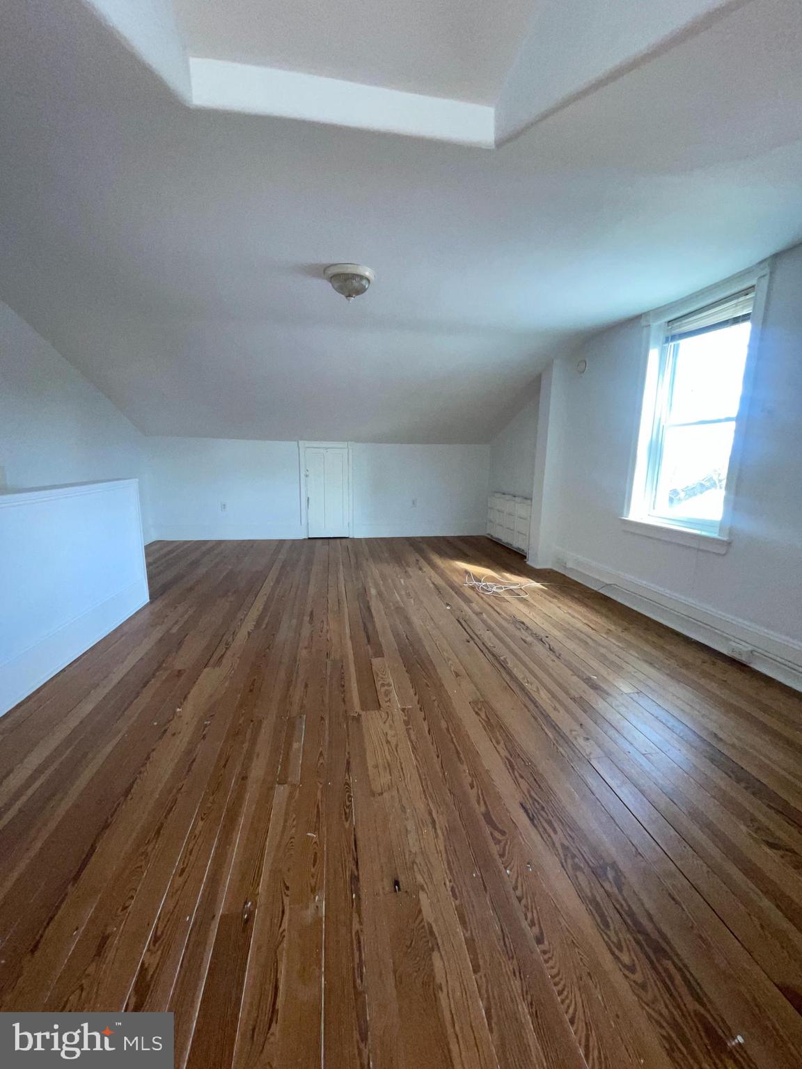 7611 Ridge Avenue, Unit 2 Philadelphia, PA 19128 - Photo 16 of 16 a view of wooden floor in a room