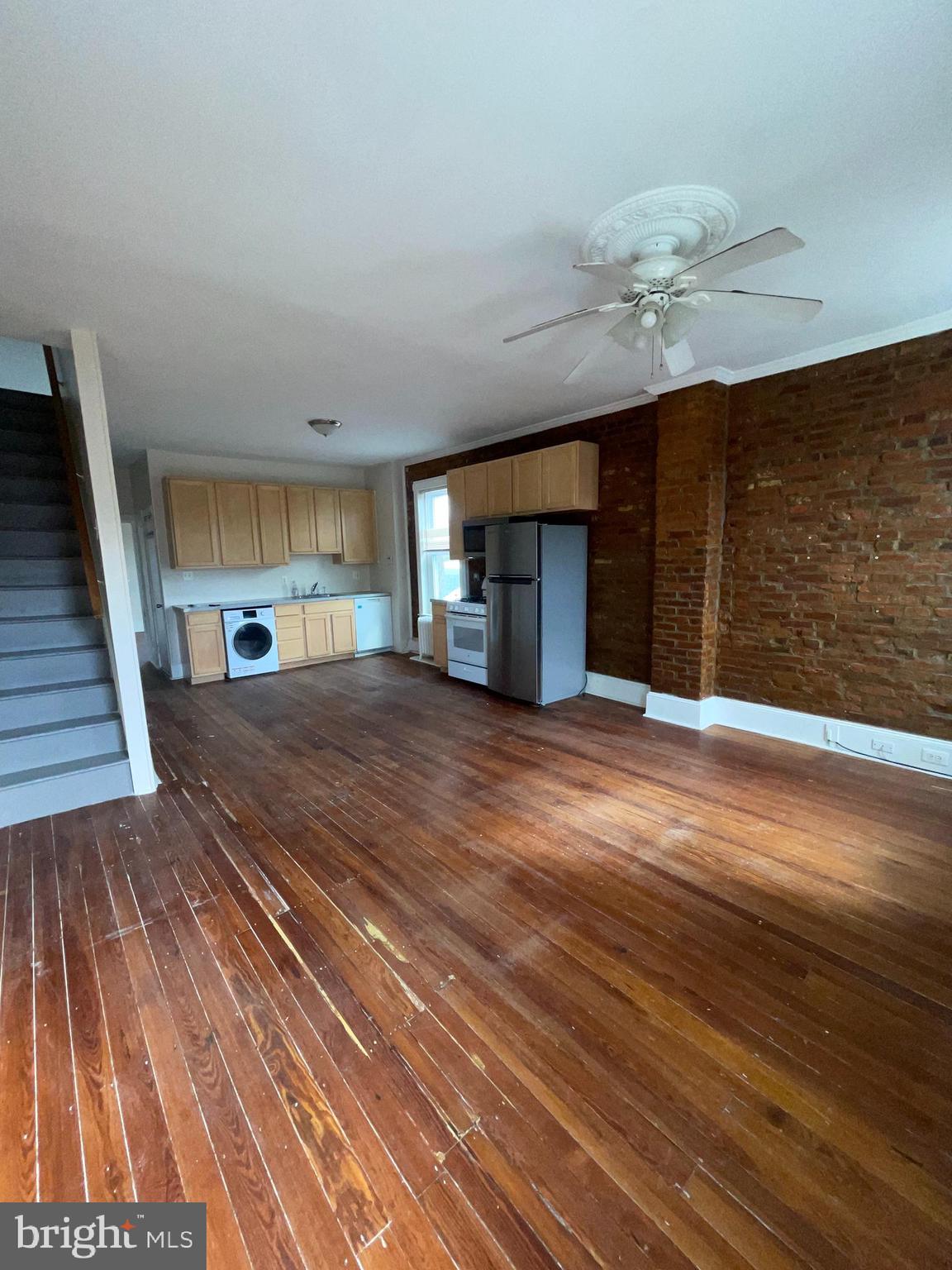 7611 Ridge Avenue, Unit 2 Philadelphia, PA 19128 - Photo 9 of 16 a view of a livingroom with wooden floor
