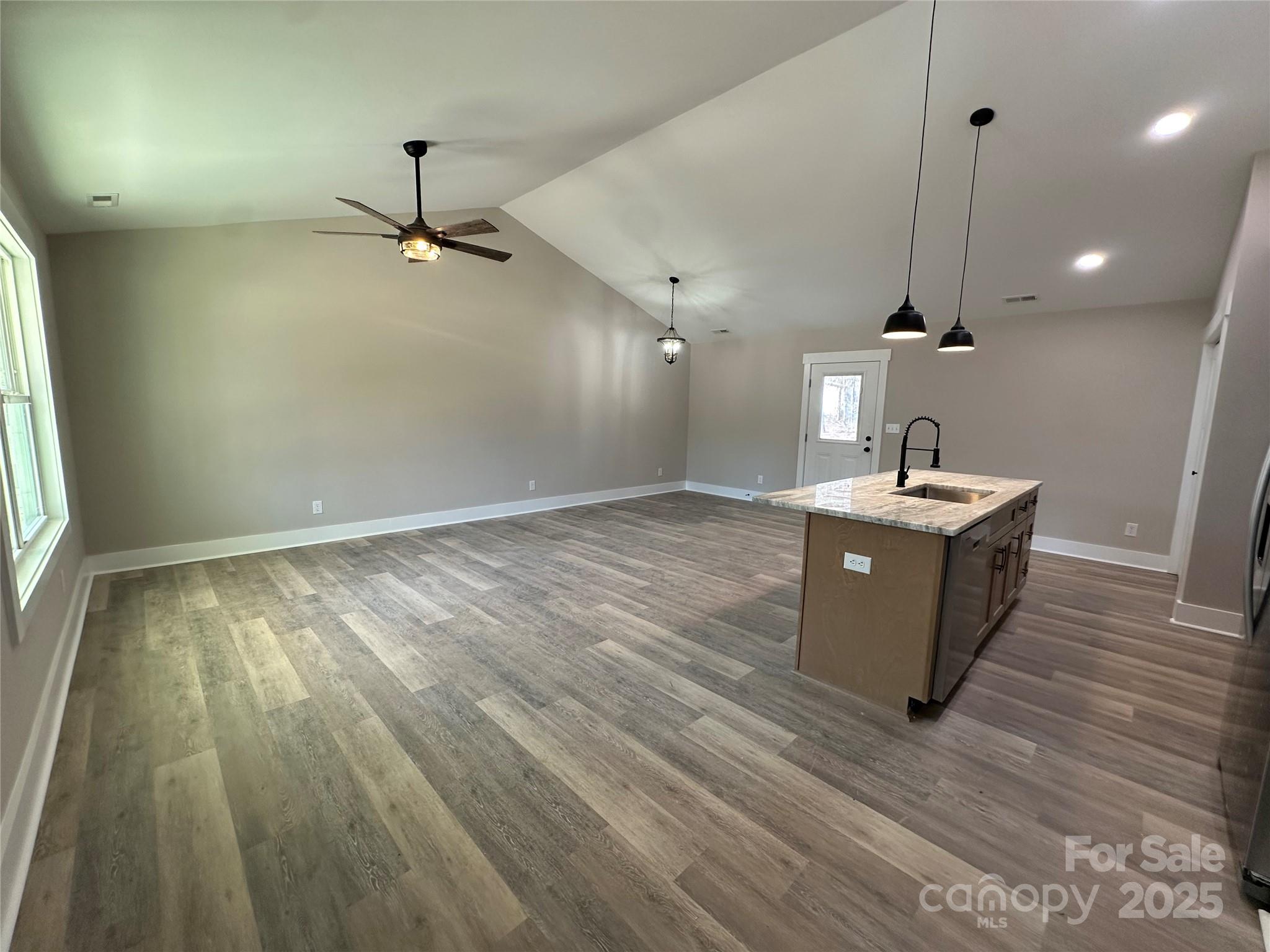 3537 Taxahaw Road Lancaster, SC 29720 - Photo 4 of 8 a room with wooden floor and window