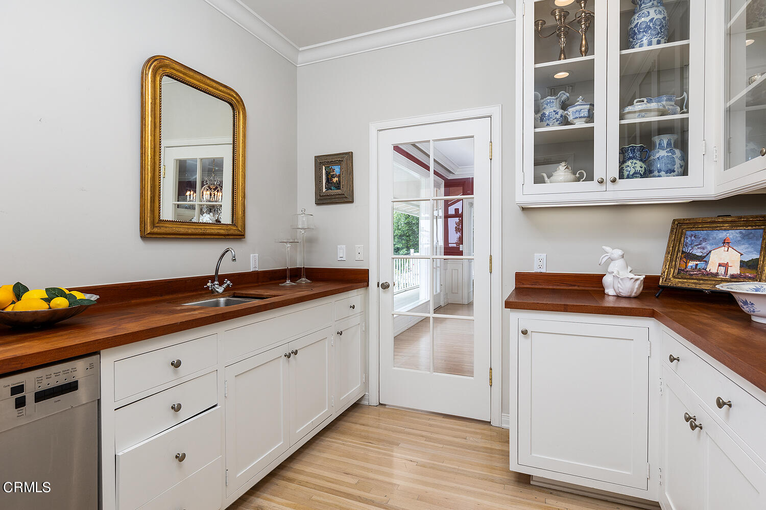 780 Huntington Circle Pasadena, CA 91106 - Photo 19 of 55 a kitchen with stainless steel appliances granite countertop a sink and wooden cabinets