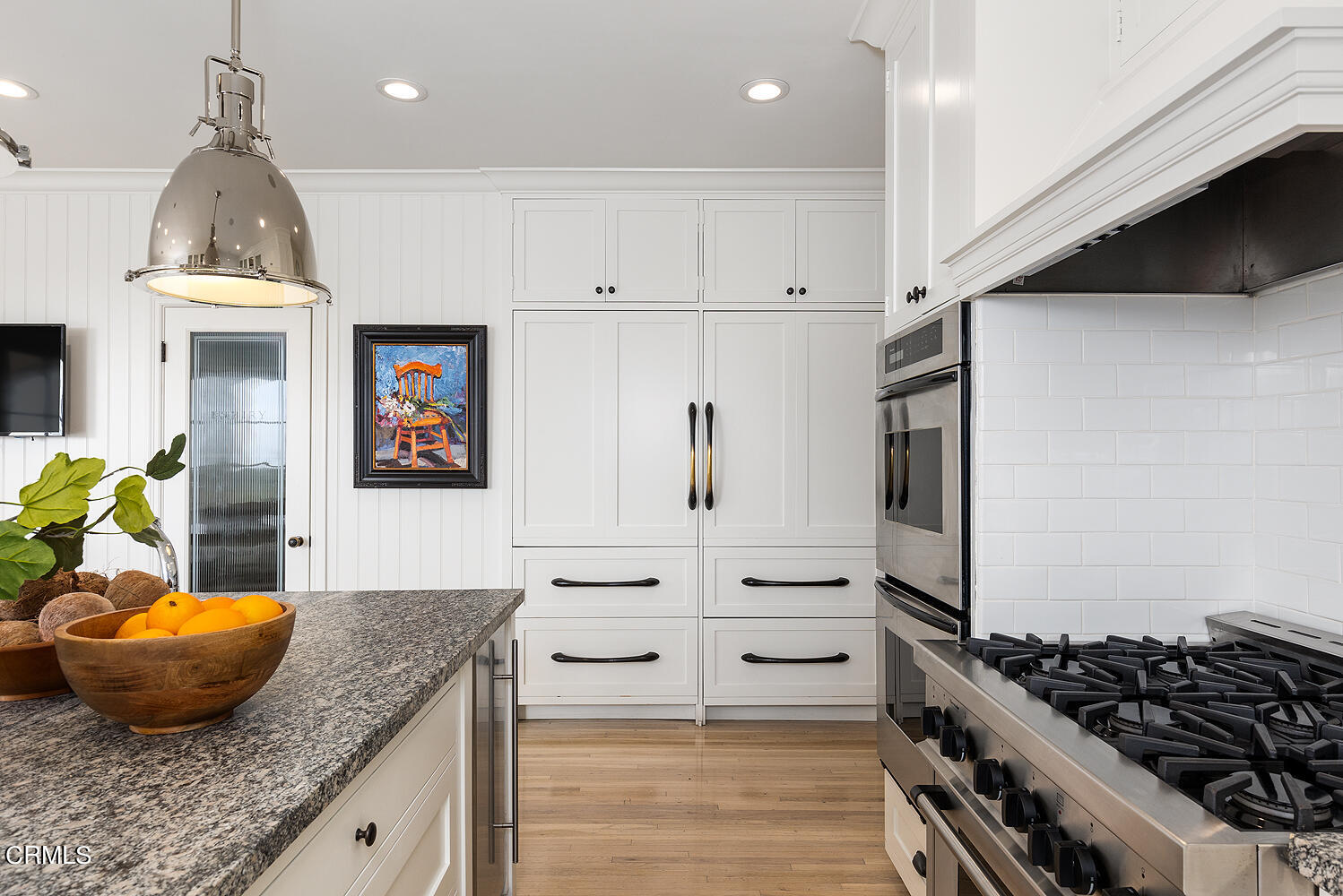 780 Huntington Circle Pasadena, CA 91106 - Photo 21 of 55 a kitchen with stainless steel appliances granite countertop a stove and a sink