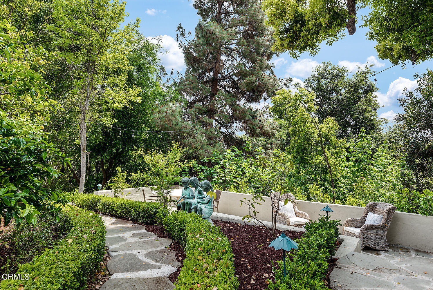 780 Huntington Circle Pasadena, CA 91106 - Photo 46 of 55 a view of a garden with plants and large trees