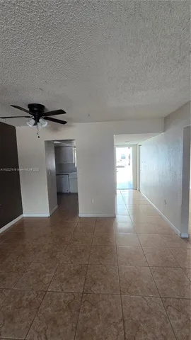 a view of hallway with a window