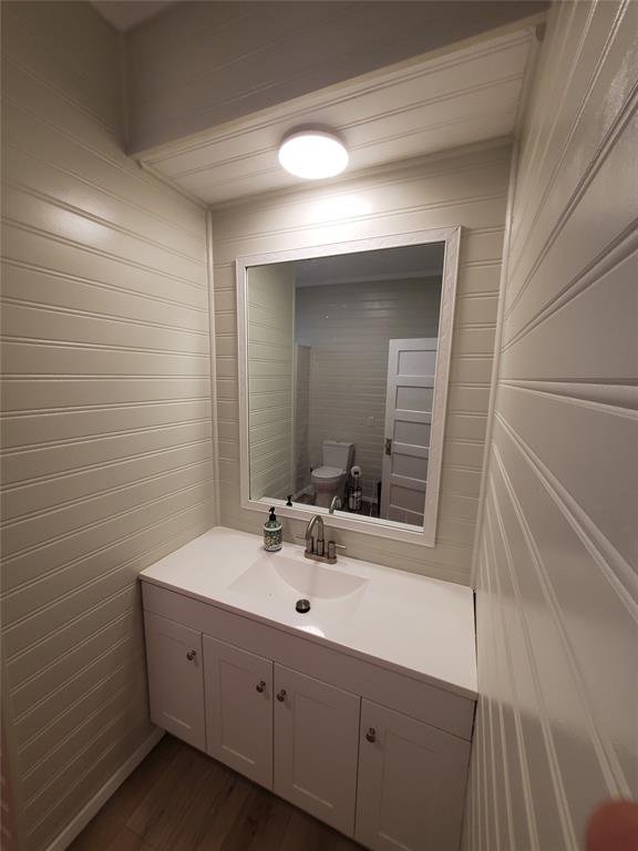 300 North Church Street Decatur, TX 76234 - Photo 14 of 19 a bathroom with a sink and a mirror