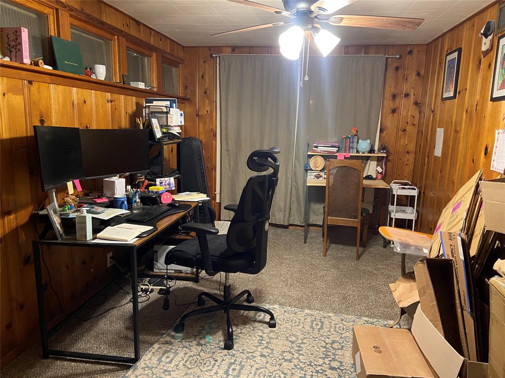 300 North Church Street Decatur, TX 76234 - Photo 17 of 19 a view of a workspace with furniture and a window