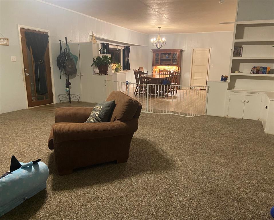 300 North Church Street Decatur, TX 76234 - Photo 4 of 19 a living room with furniture and a table
