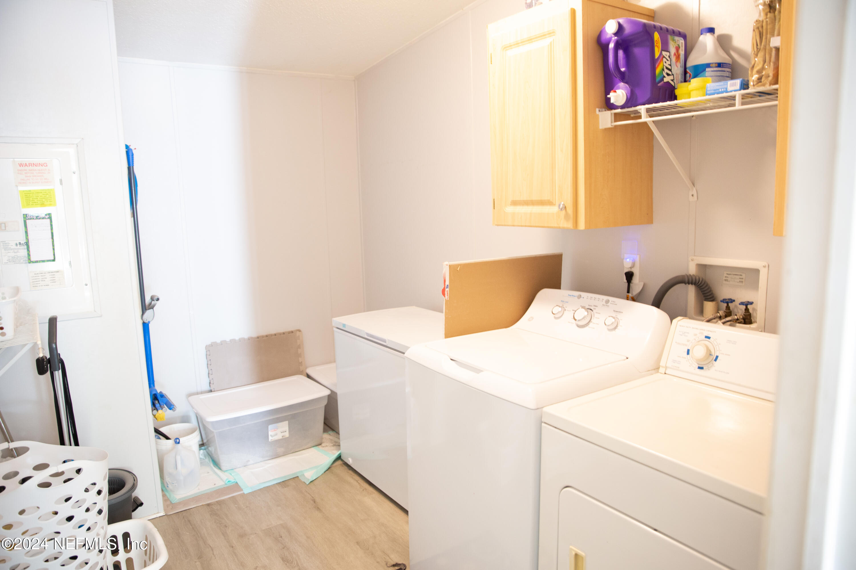 5518 Long Branch Cemetery Road Jacksonville, FL 32234 - Photo 22 of 22 a utility room with dryer and washer
