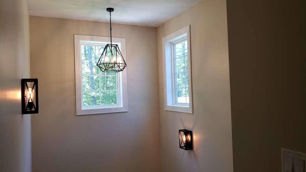 6 Quigley Road Southampton, MA 01073 - Photo 16 of 24 a close view of an entryway and chandelier