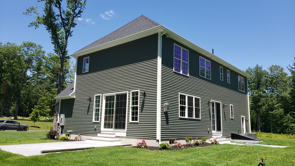 6 Quigley Road Southampton, MA 01073 - Photo 5 of 24 a front view of a house with a yard