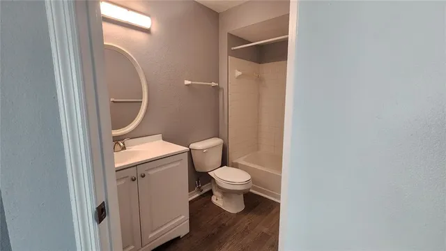 a bathroom with a toilet and a sink