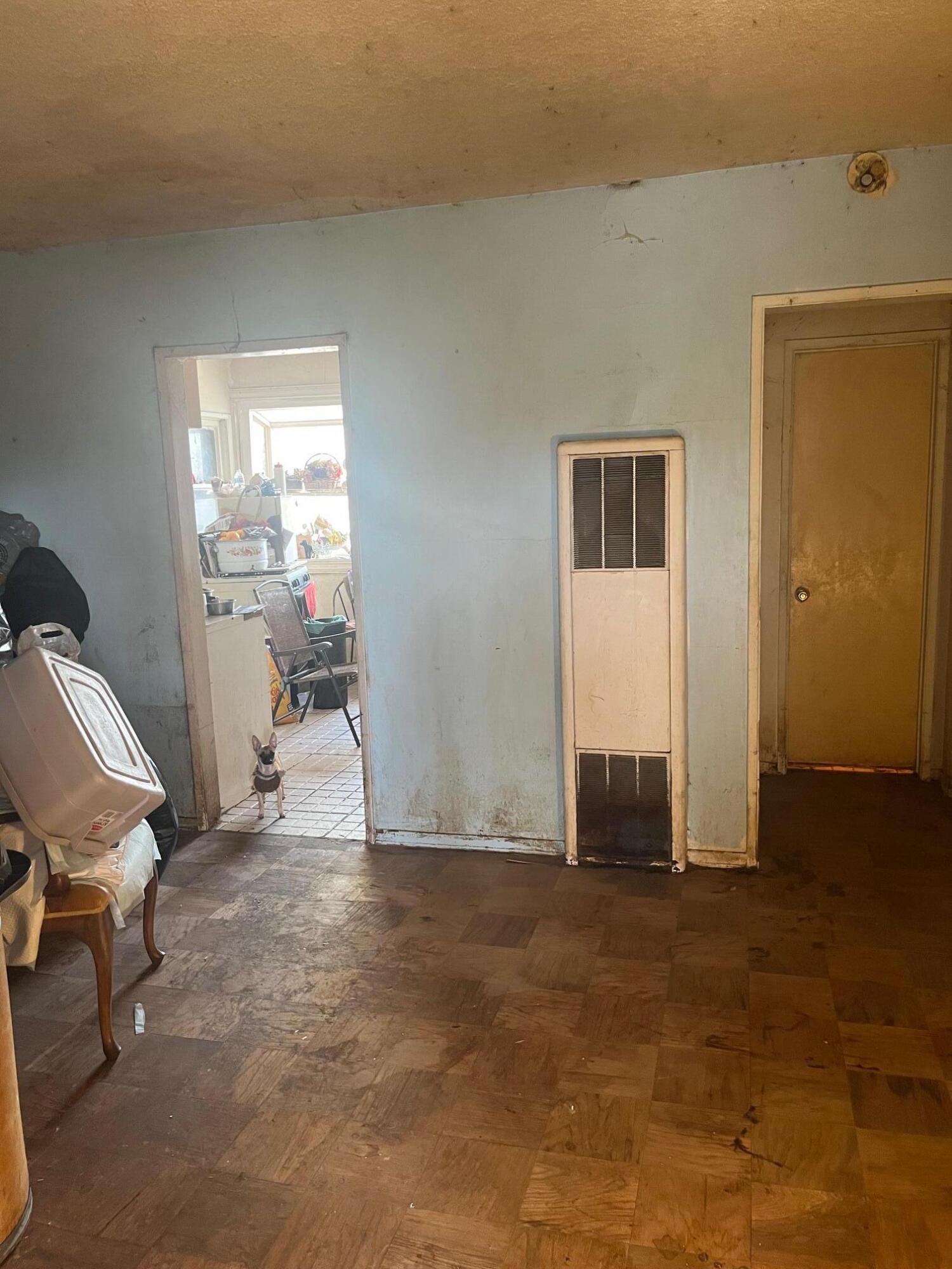 239 Ave P-3 Palmdale, CA 93550 - Photo 2 of 5 a view of livingroom with workspace and windows