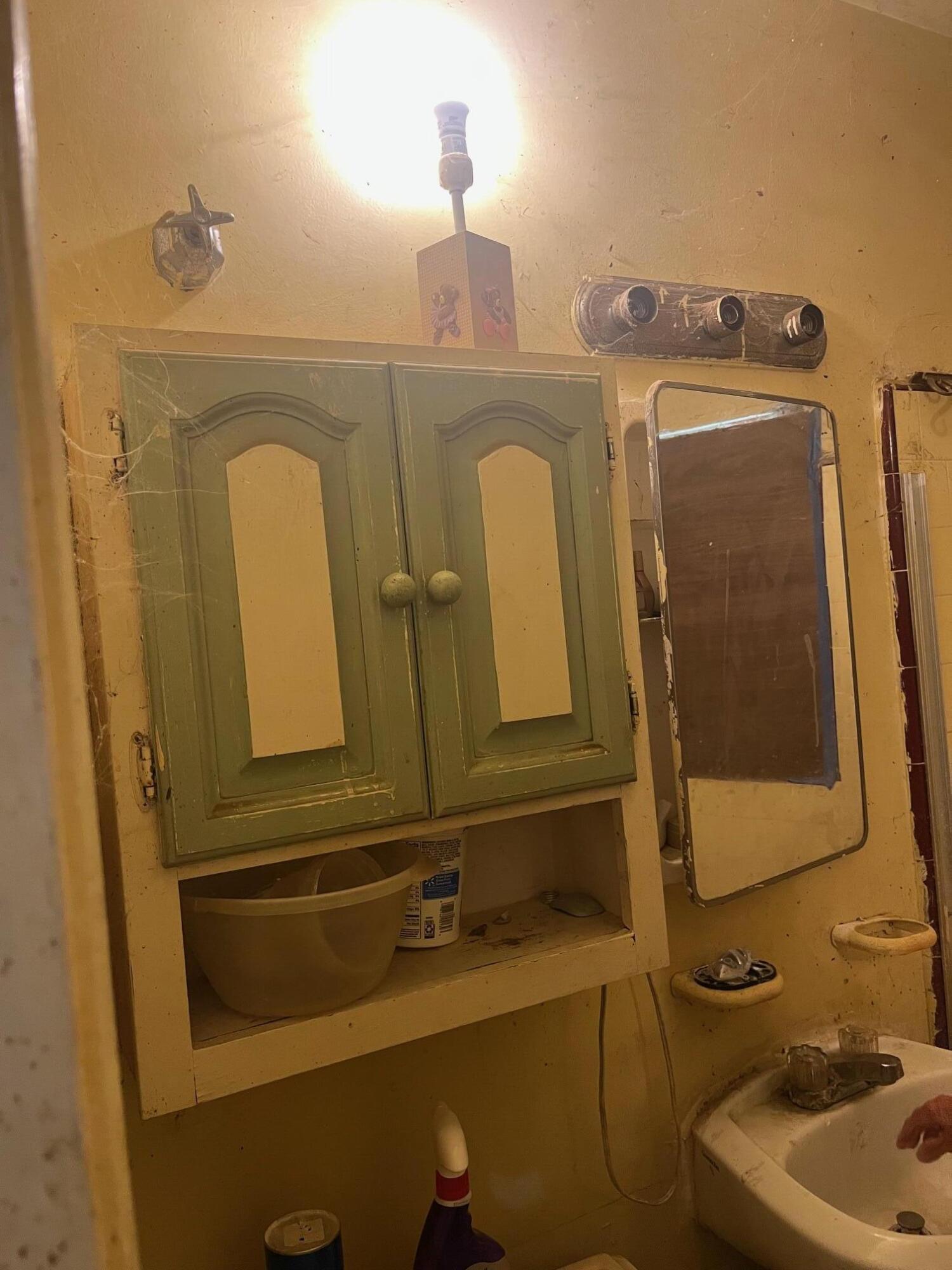 239 Ave P-3 Palmdale, CA 93550 - Photo 5 of 5 a bathroom with a sink and a mirror