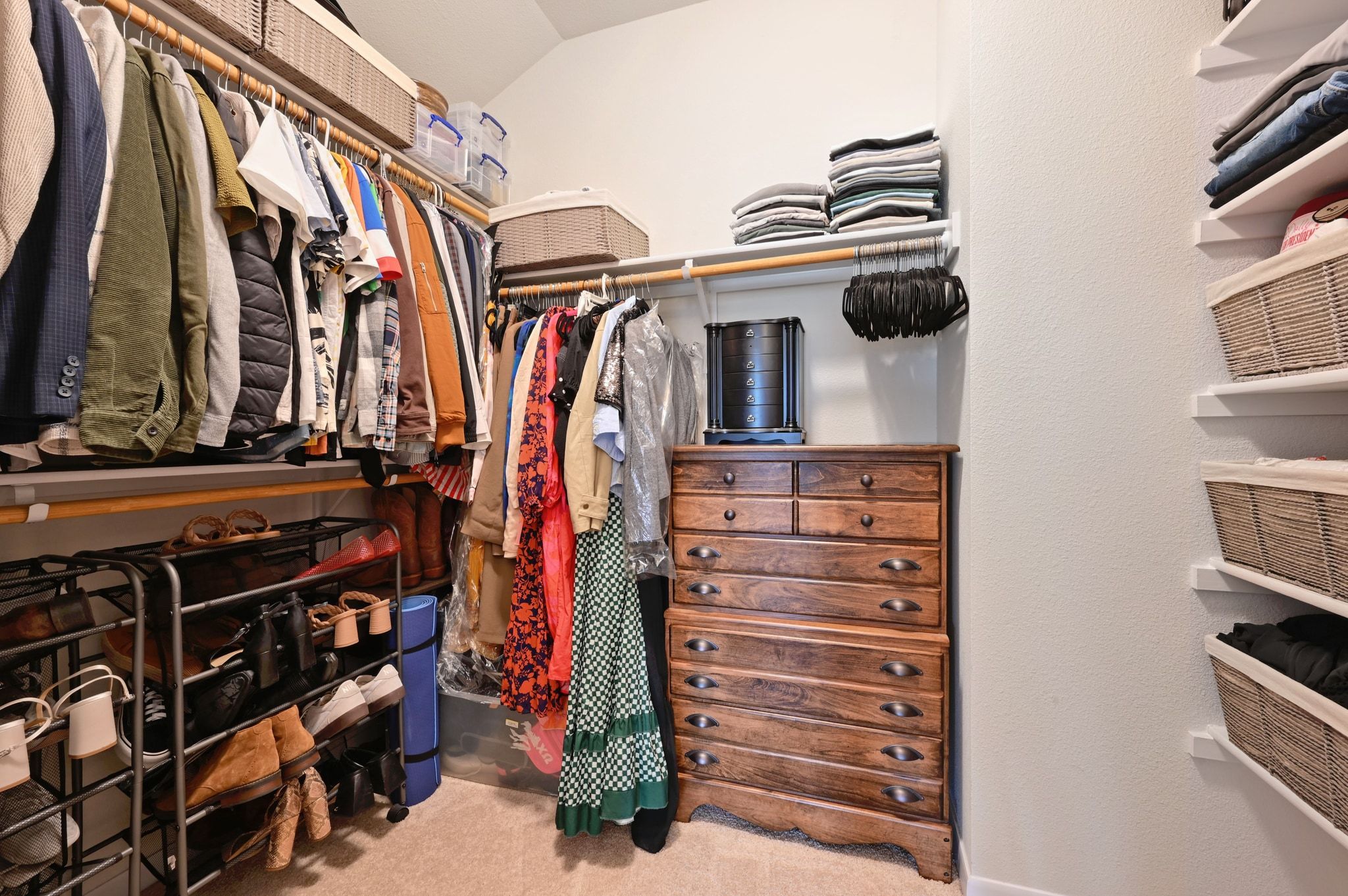 16620 Sumptuous Drive Manor, TX 78653 - Photo 20 of 40 Sizable primary walk in closet with ideal storage space.