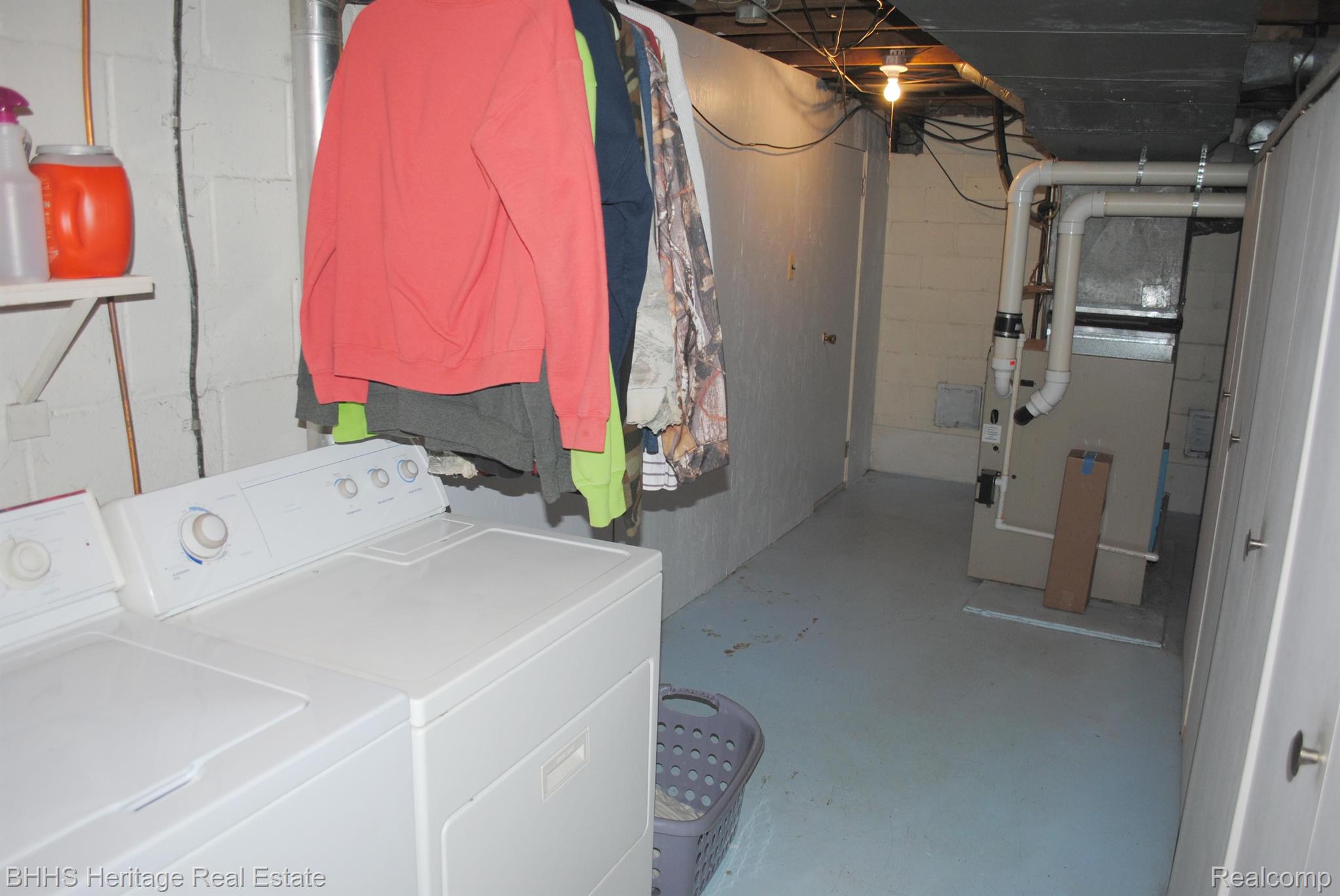 2620 South Latson Road Howell, MI 48843 - Photo 33 of 40 basement laundry area and mechanicals