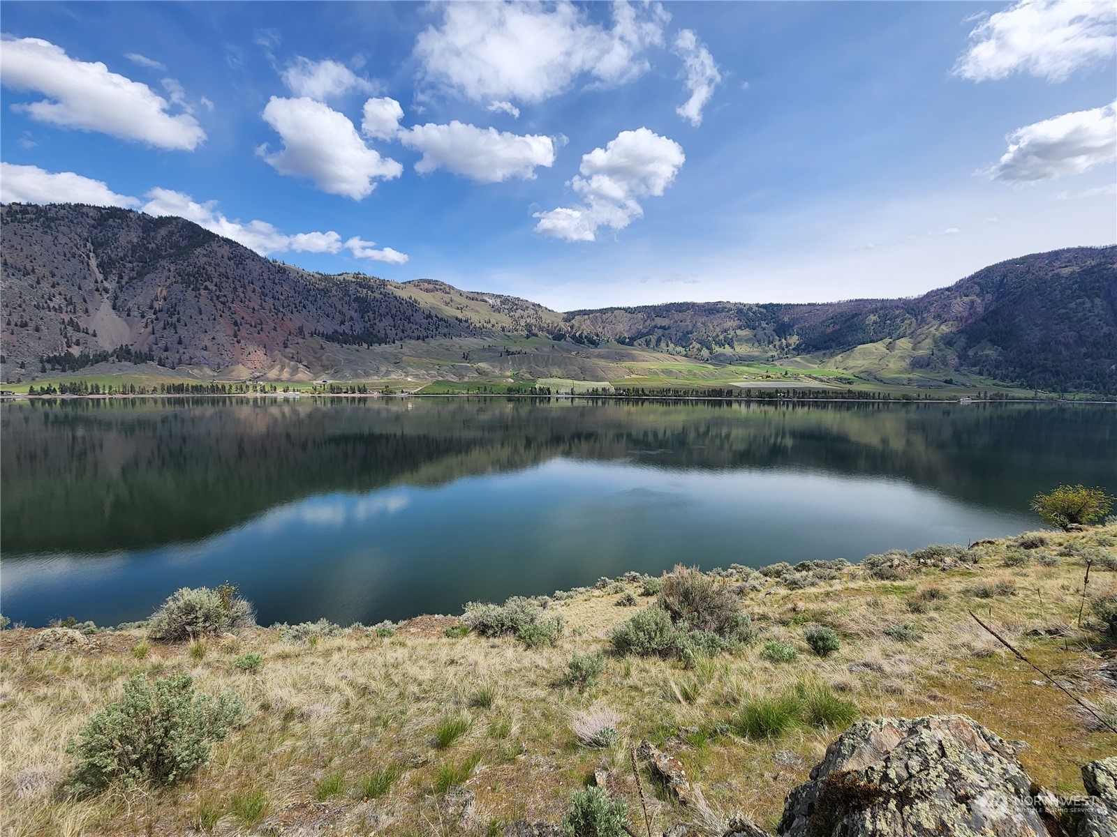 0 Palmer Lake Loomis, WA 98827 - Photo 12 of 30 a view of a lake in between of a city