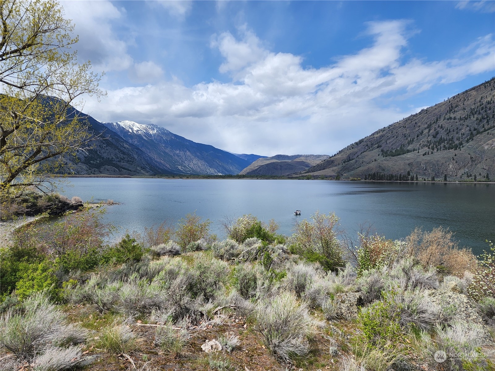 0 Palmer Lake Loomis, WA 98827 - Photo 2 of 30 a view of a lake with a mountain in the background