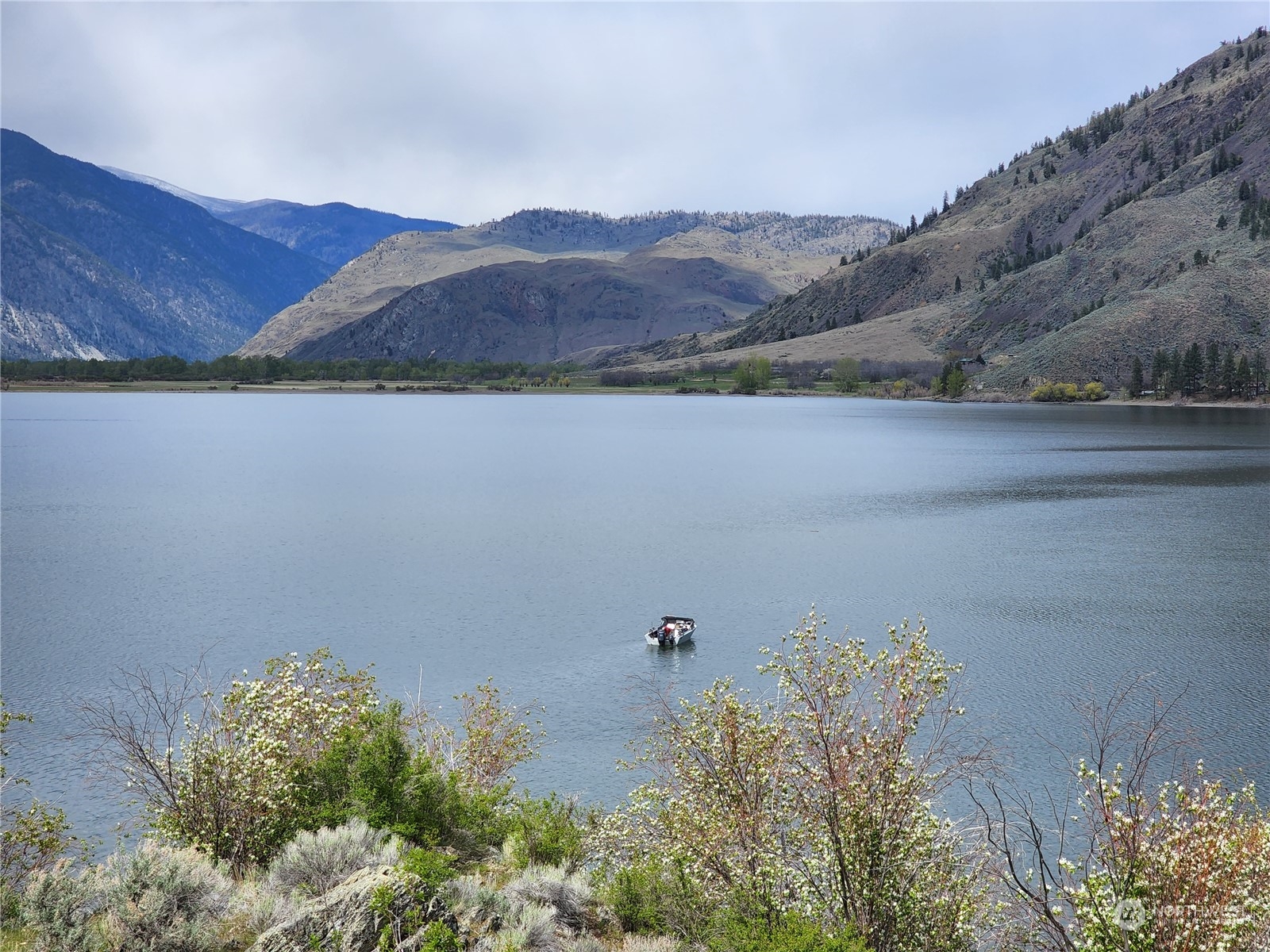 0 Palmer Lake Loomis, WA 98827 - Photo 3 of 30 a view of a lake with a mountain