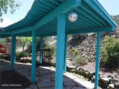 a view of backyard with tub