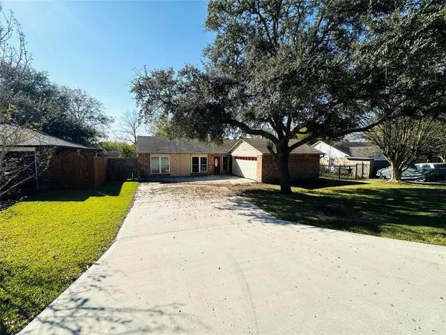 a house view with a garden space