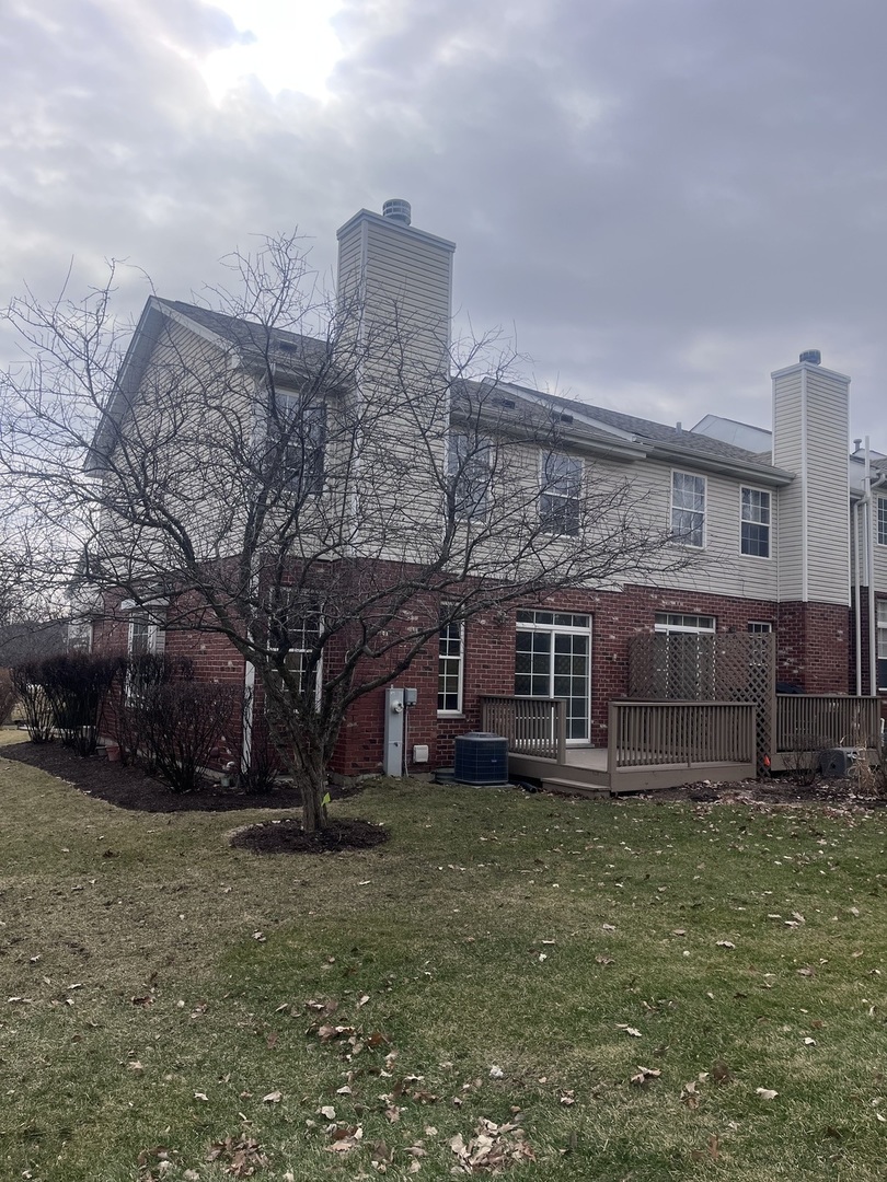 547 Goodwin Drive Bolingbrook, IL 60440 - Photo 35 of 36 a view of a house with a yard