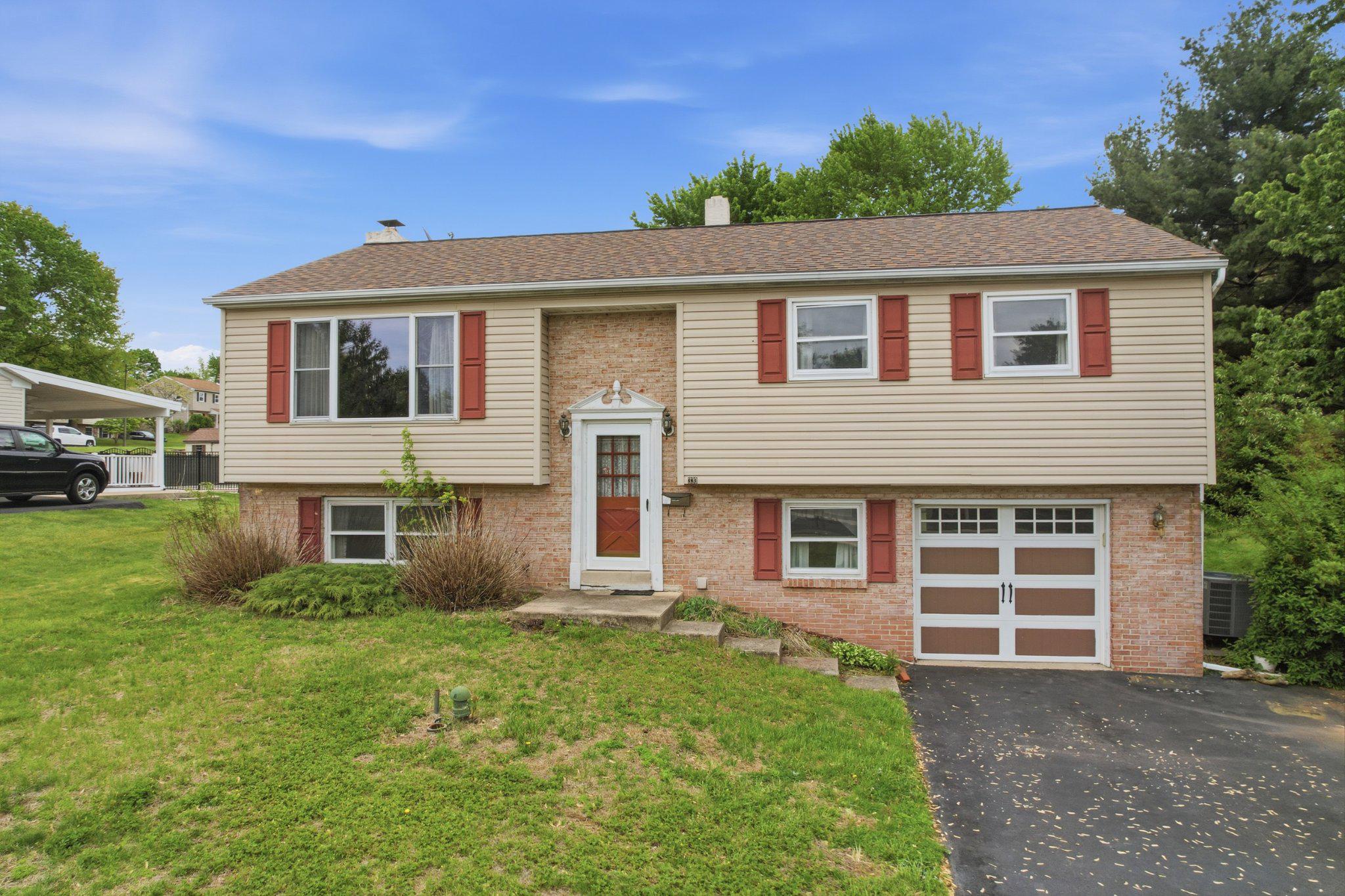 330 Wexford Road Red Hill, PA 18076 - Photo 1 of 54 a front view of a house with garden