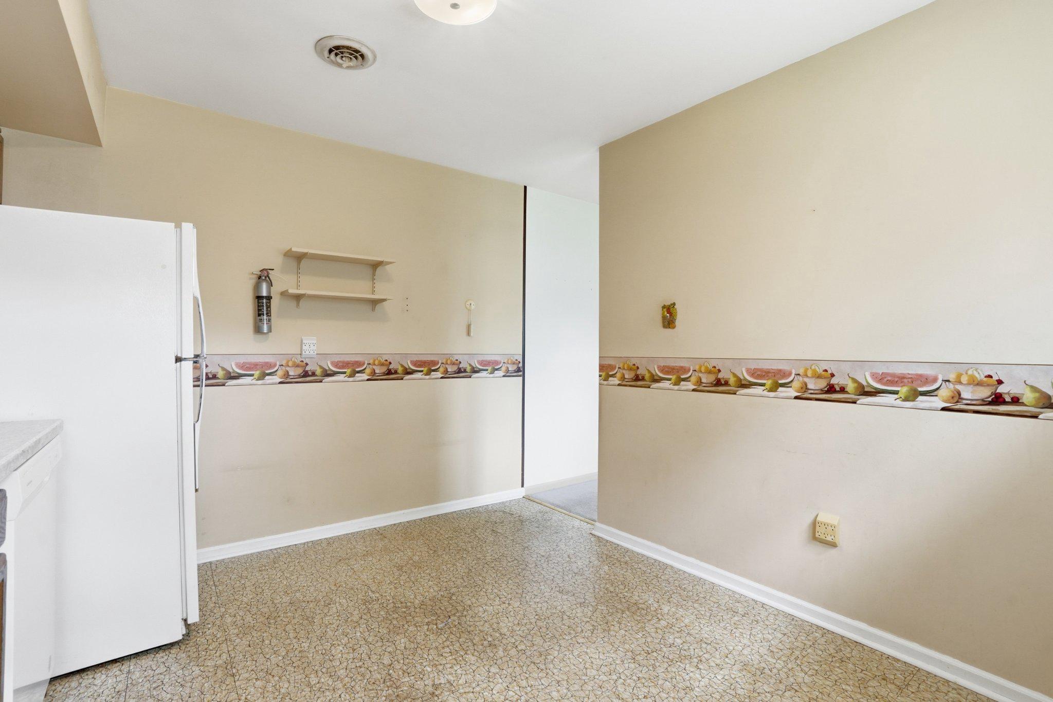330 Wexford Road Red Hill, PA 18076 - Photo 12 of 54 a view of cabinets and refrigerator