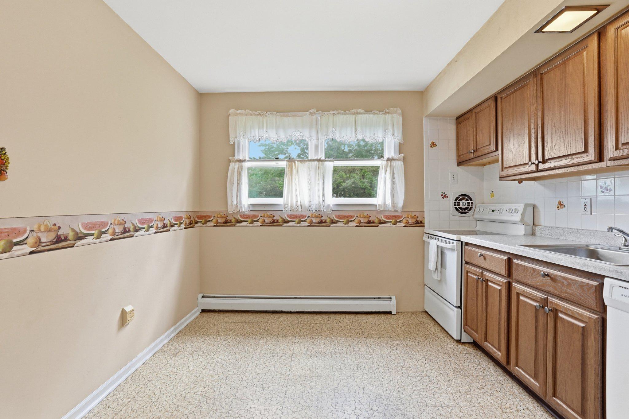 330 Wexford Road Red Hill, PA 18076 - Photo 14 of 54 a view of a kitchen with a sink and dishwasher