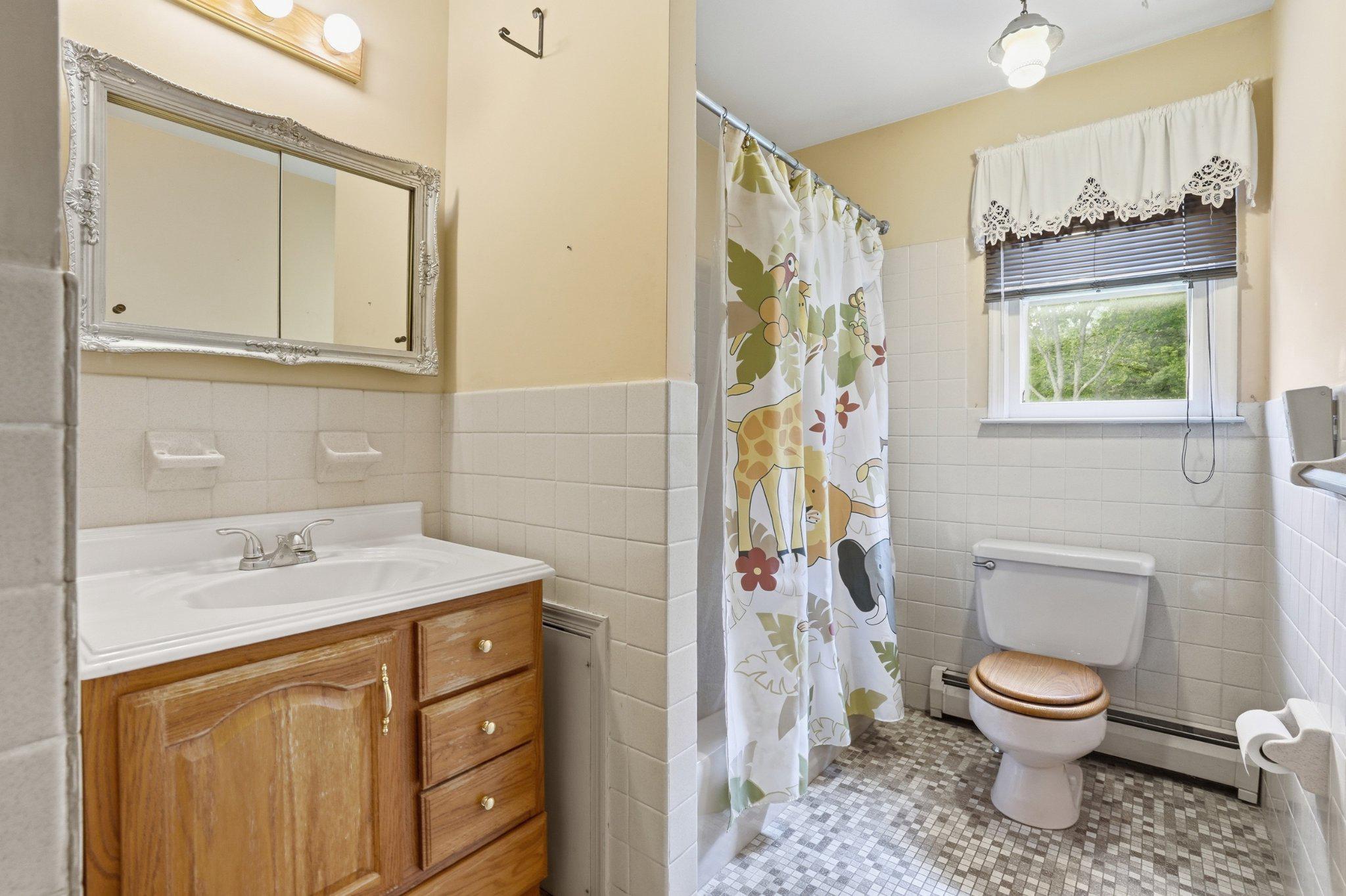 330 Wexford Road Red Hill, PA 18076 - Photo 19 of 54 a bathroom with a sink toilet and shower
