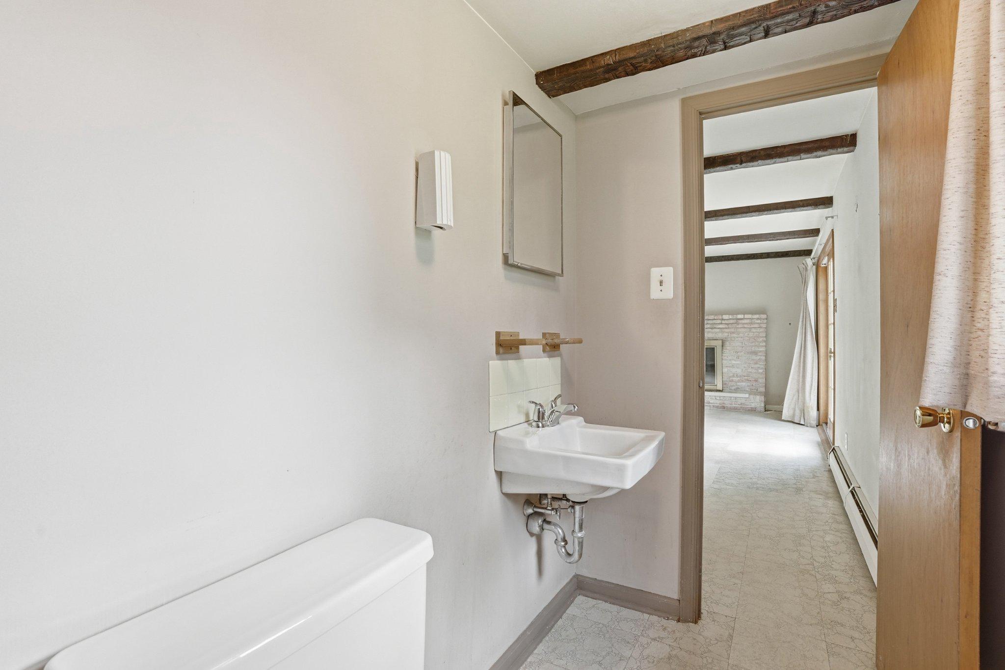 330 Wexford Road Red Hill, PA 18076 - Photo 27 of 54 a bathroom with a sink toilet and tub