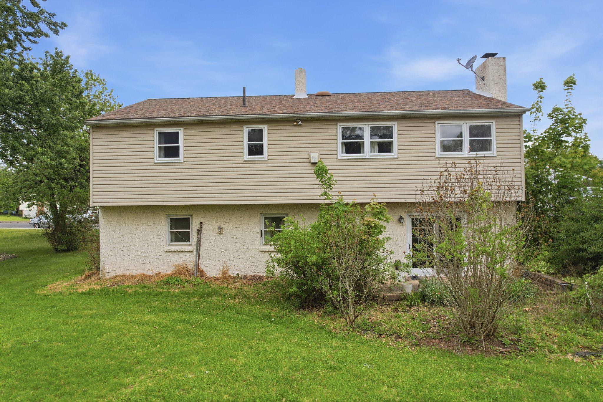 330 Wexford Road Red Hill, PA 18076 - Photo 40 of 54 a view of a house with a yard
