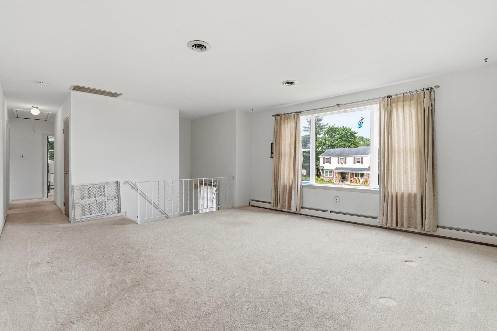 330 Wexford Road Red Hill, PA 18076 - Photo 4 of 54 an empty room with windows