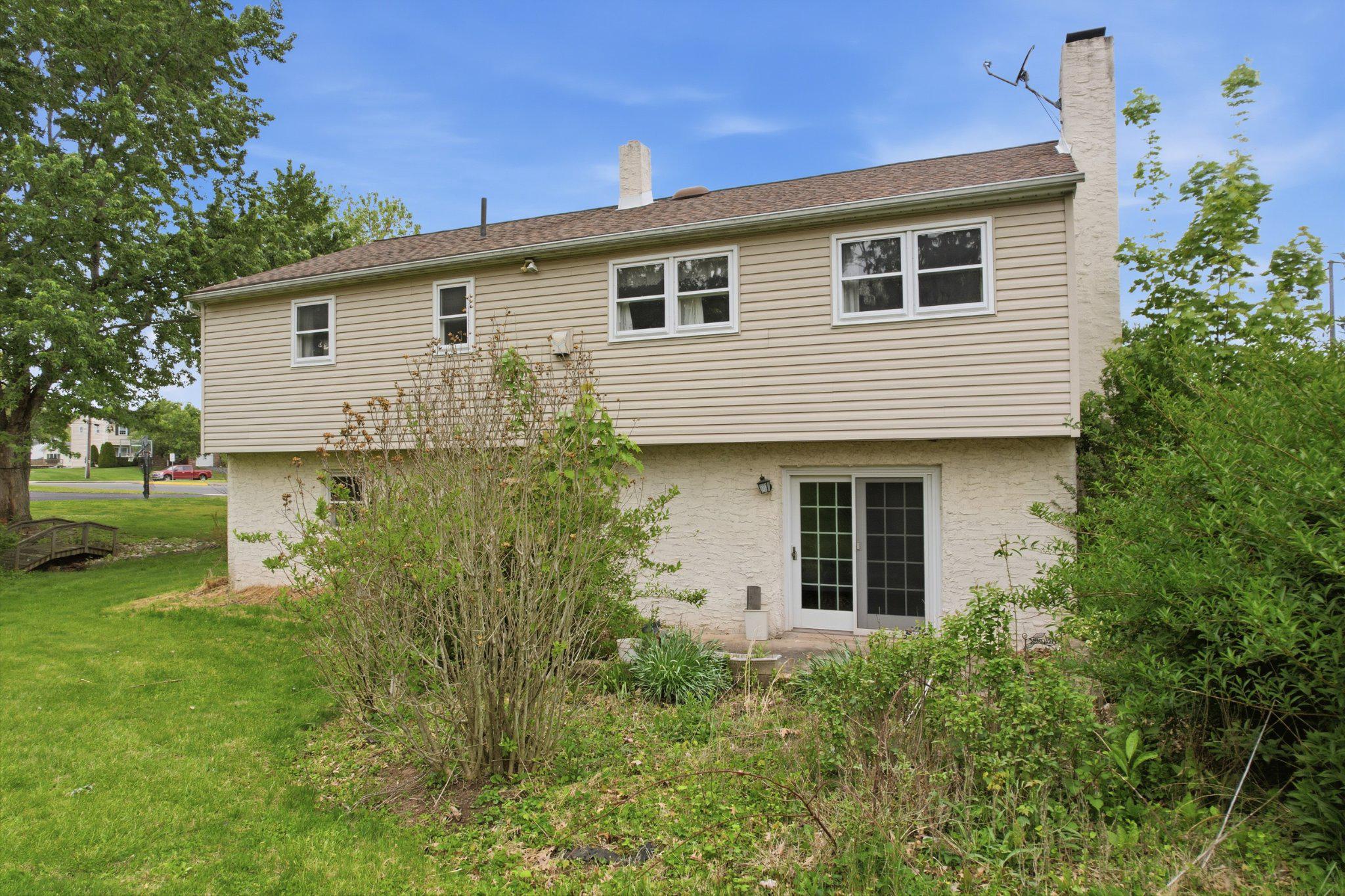330 Wexford Road Red Hill, PA 18076 - Photo 41 of 54 a view of a house with pool and garden