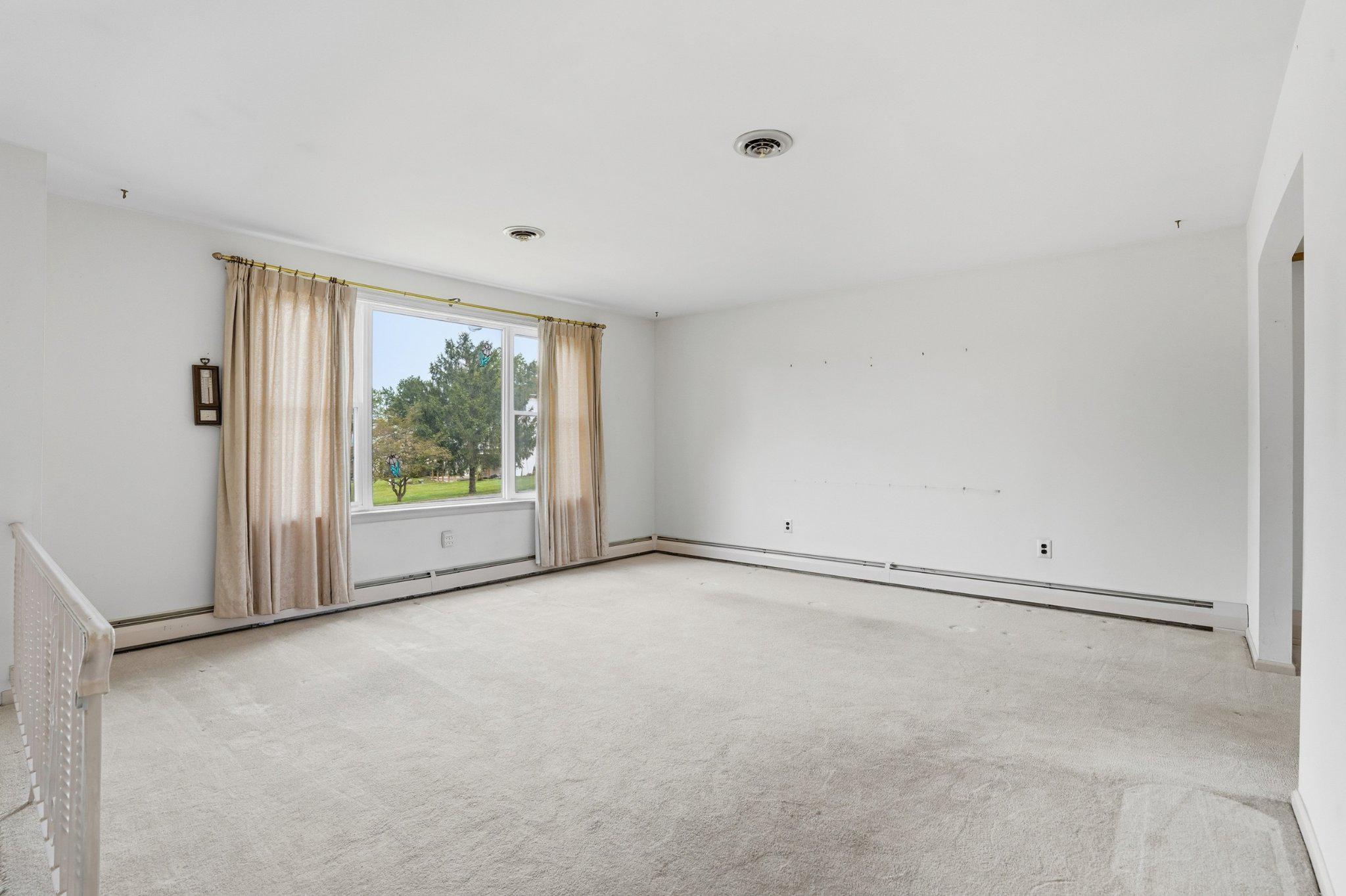 330 Wexford Road Red Hill, PA 18076 - Photo 5 of 54 a view of an empty room with a window