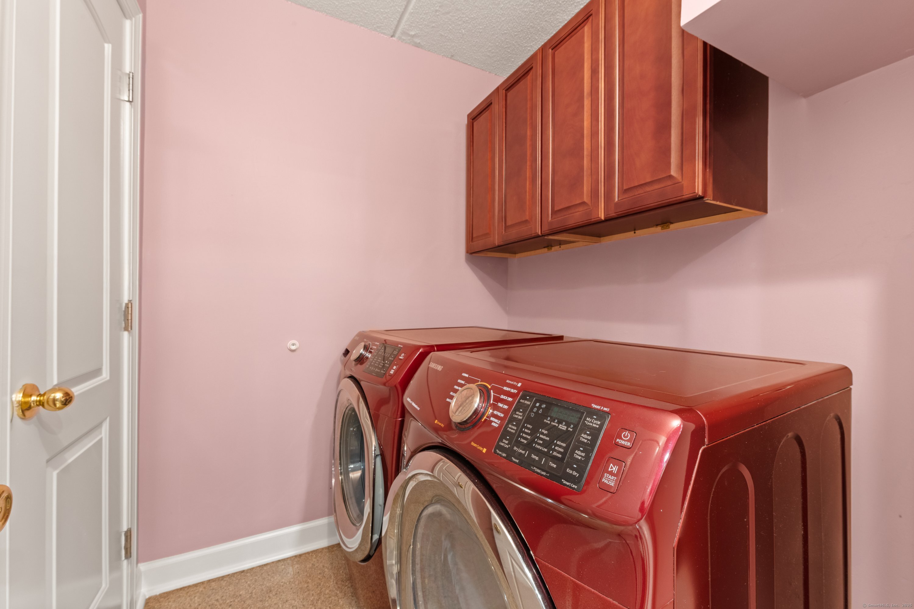 143 Hoyt Street, Unit 1A Stamford, CT 06905 - Photo 16 of 32 a utility room with dryer and washer