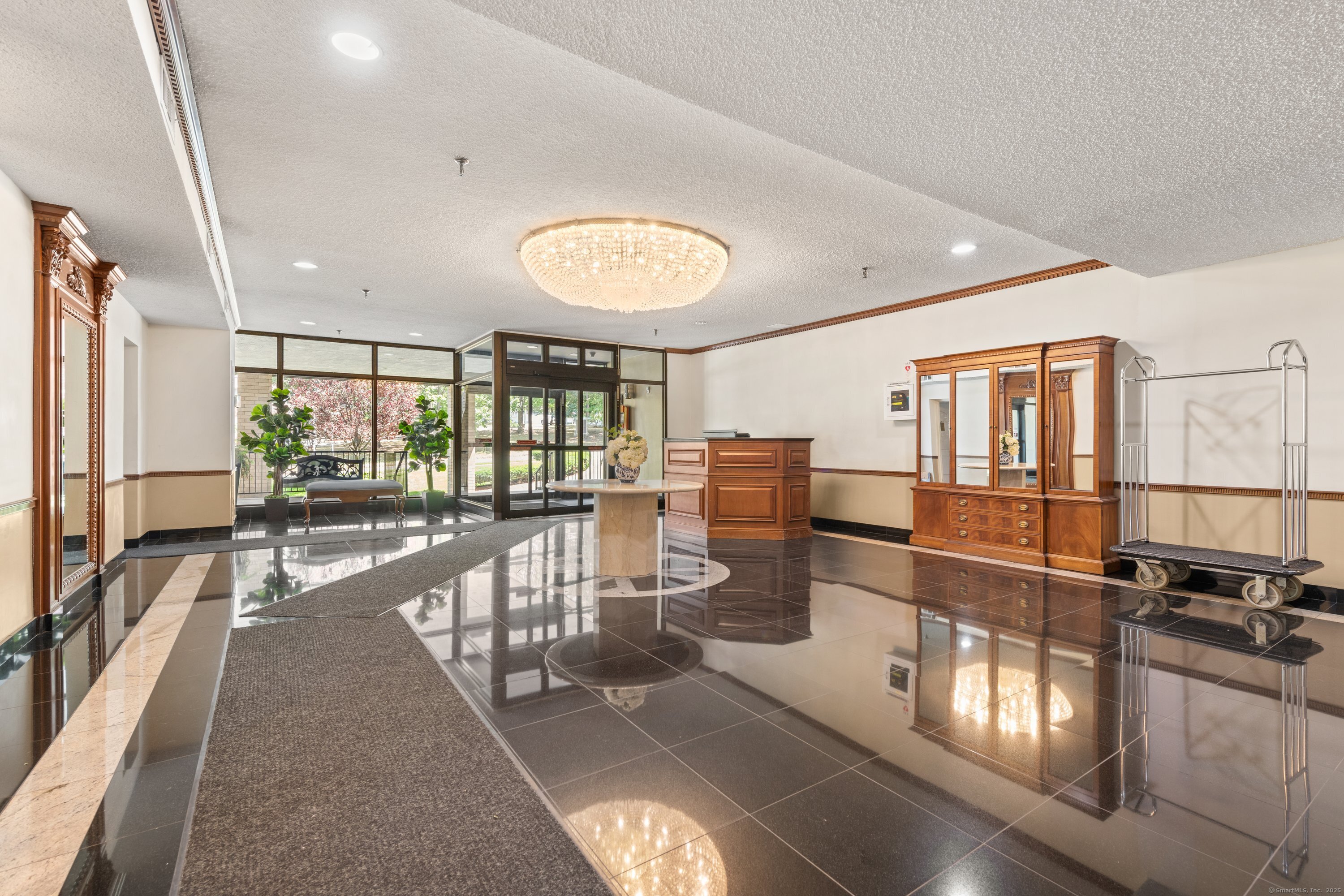 143 Hoyt Street, Unit 1A Stamford, CT 06905 - Photo 2 of 32 a view of a room with lots of gym equipment