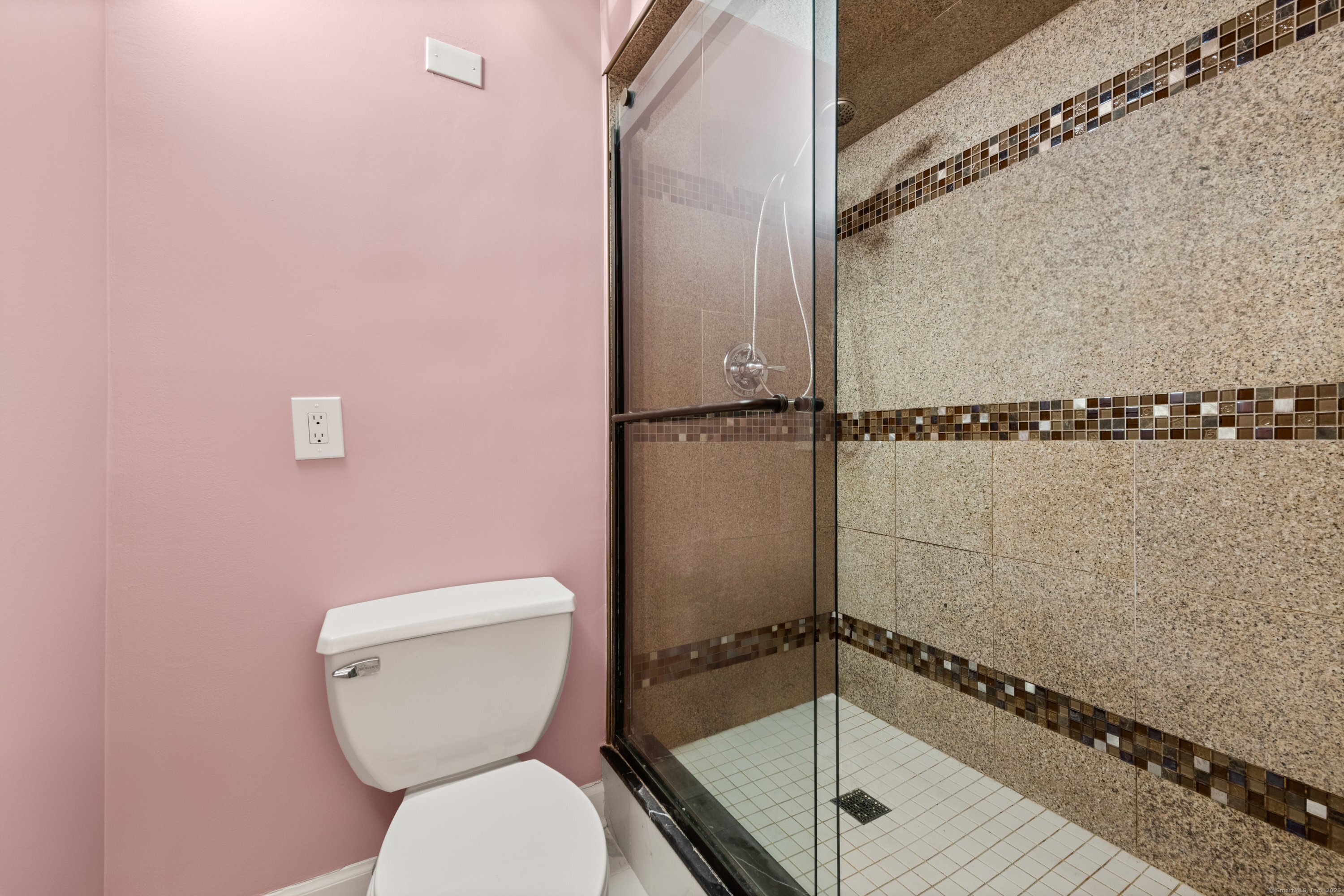 143 Hoyt Street, Unit 1A Stamford, CT 06905 - Photo 24 of 32 a bathroom with a toilet and a shower