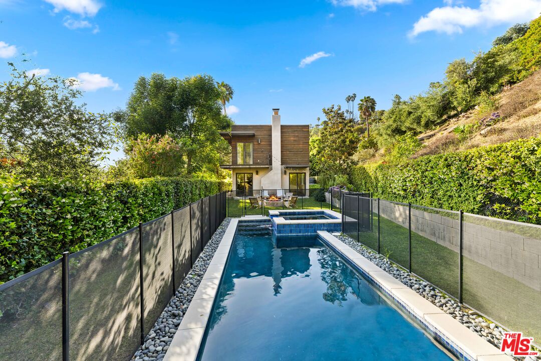 13501 Bayliss Road Los Angeles, CA 90049 - Photo 29 of 33 a view of balcony and yard
