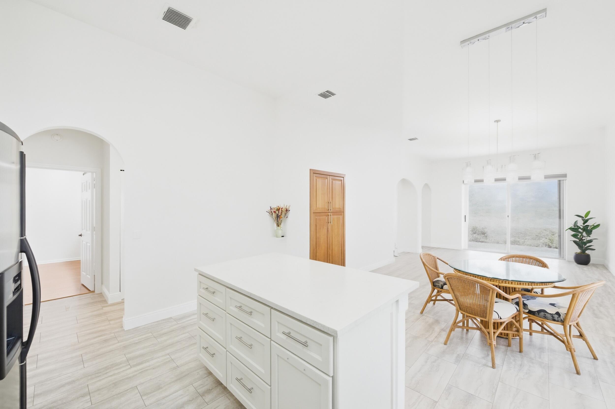 8534 Vía D Oro Boca Raton, FL 33433 - Photo 10 of 34 a spacious bathroom with a sink and a mirror