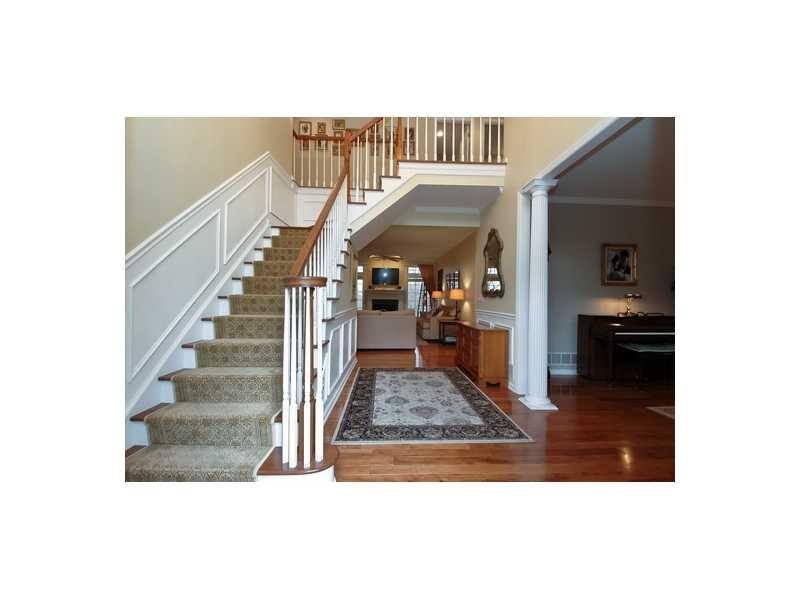 706 Rustic Ridge Cranberry Township, PA 16066 - Photo 2 of 18 Entry/Foyer. GRAND ENTRANCE,TURNED STAIRCASE,HICKORY HW,ELEGANT RUNNER,PICTURE FRAME MOULDING