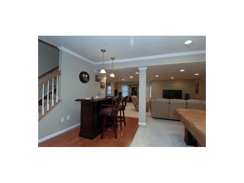 706 Rustic Ridge Cranberry Township, PA 16066 - Photo 13 of 18 Basement/Game Room. PLENTY OF LIGHT FROM RECESSED AND PENDANTS,HARDWOOD PLUS NEUTRAL CARPET