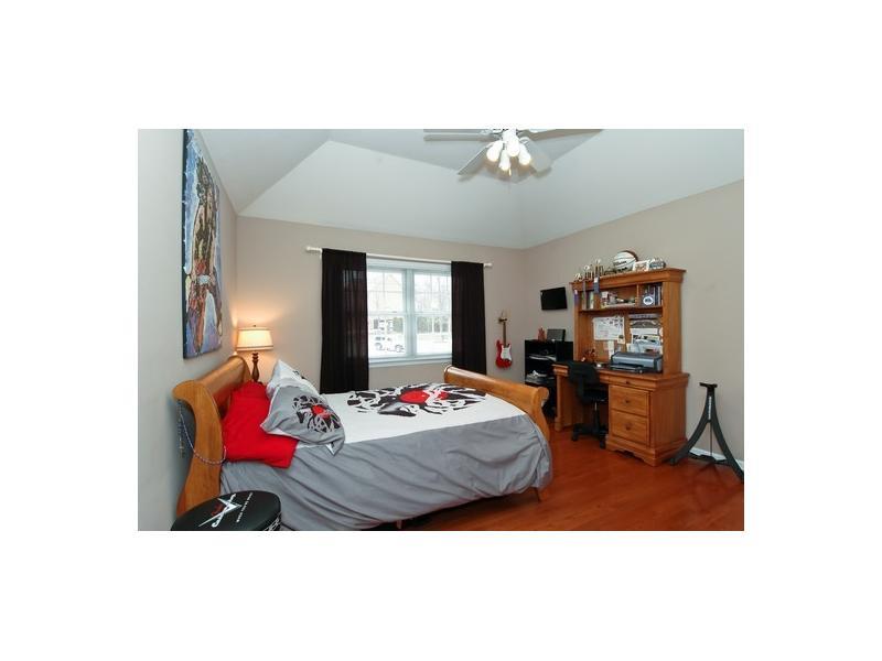 706 Rustic Ridge Cranberry Township, PA 16066 - Photo 10 of 18 Bedroom. JUNIORSUITE W/HICKORY HW,TRAY CEILING,FULL BATH,SPACIOUS WALKIN