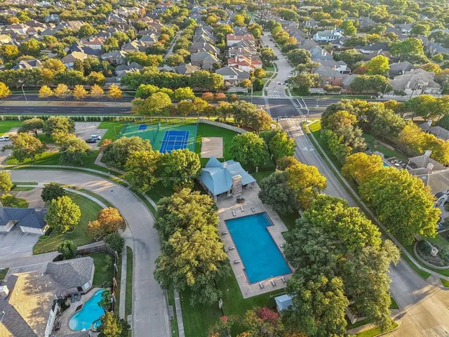 a view of an outdoor space and tennis court