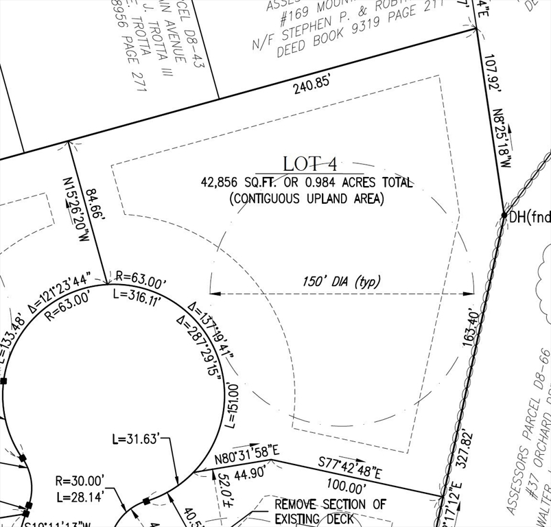 77 Old Cart Path Lane, Unit LOT 4 Pembroke, MA 02359 - Photo 7 of 8 a black and white photo of a book