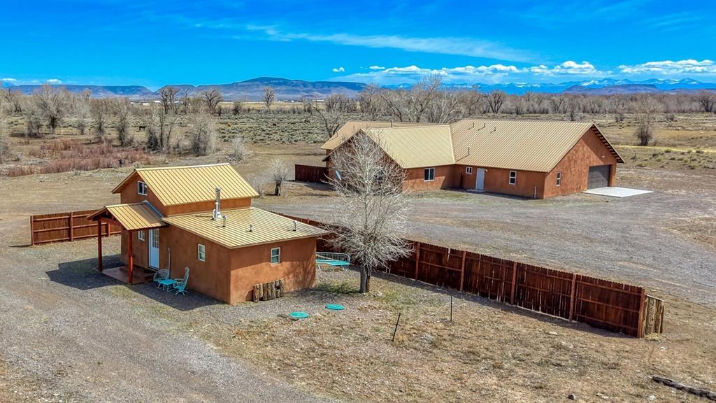 14285 County Rd E 5 Antonito, CO 81120 - Photo 1 of 72 a view of a terrace with wooden fence