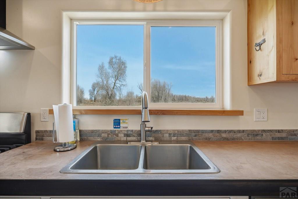 14285 County Rd E 5 Antonito, CO 81120 - Photo 16 of 72 a kitchen with a sink and a window