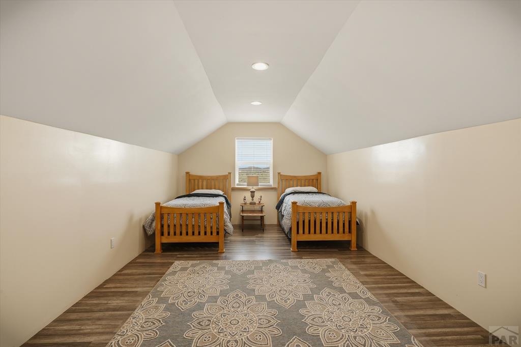 14285 County Rd E 5 Antonito, CO 81120 - Photo 25 of 72 a spacious bedroom with two beds and a couch