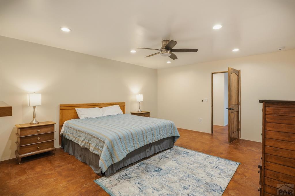 14285 County Rd E 5 Antonito, CO 81120 - Photo 30 of 72 a bedroom with a bed and a walk in closet