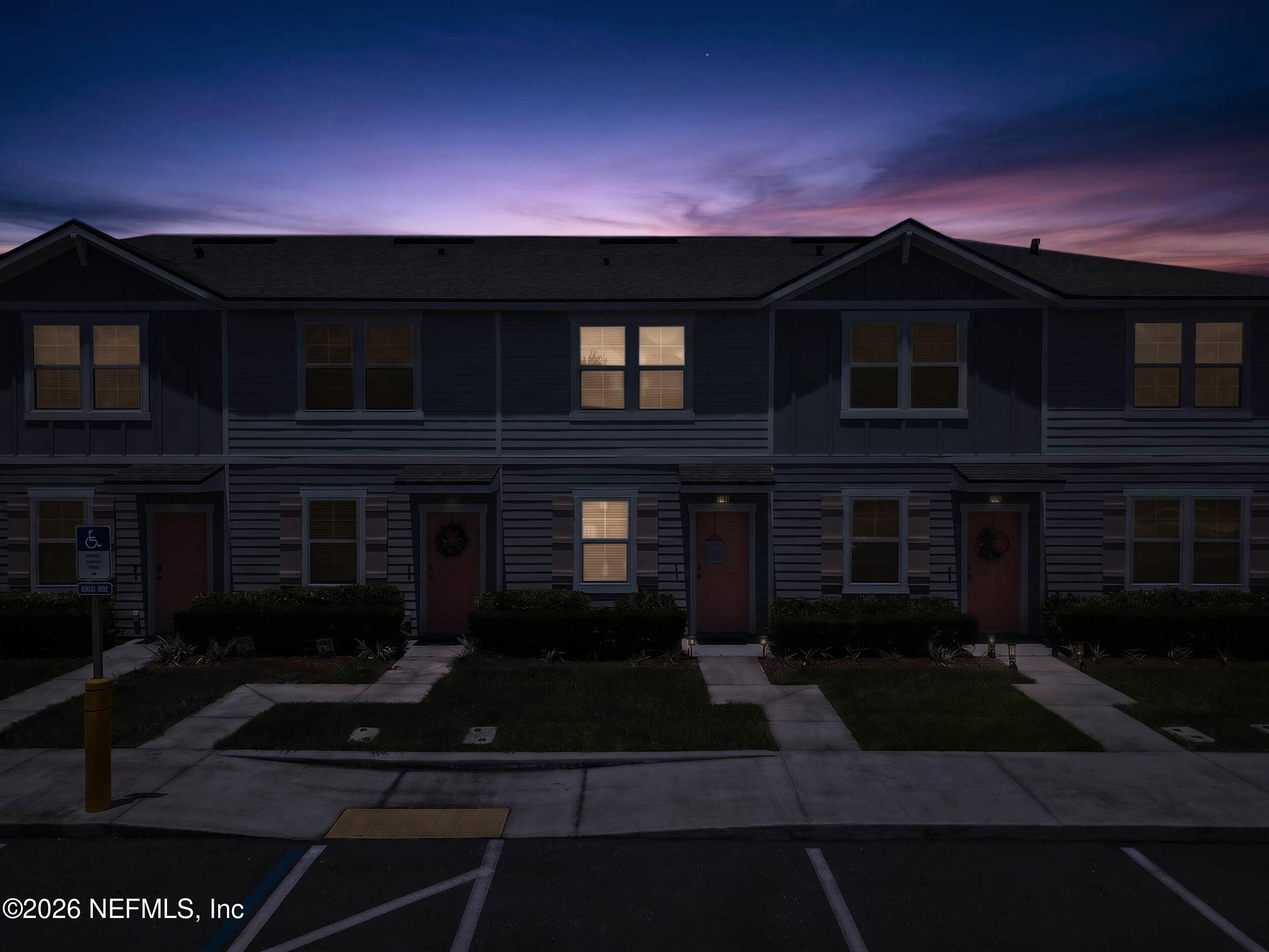 3933 Oak Mill Road Orange Park, FL 32065 - Photo 49 of 80 68_aerial front facade 2 twilight
