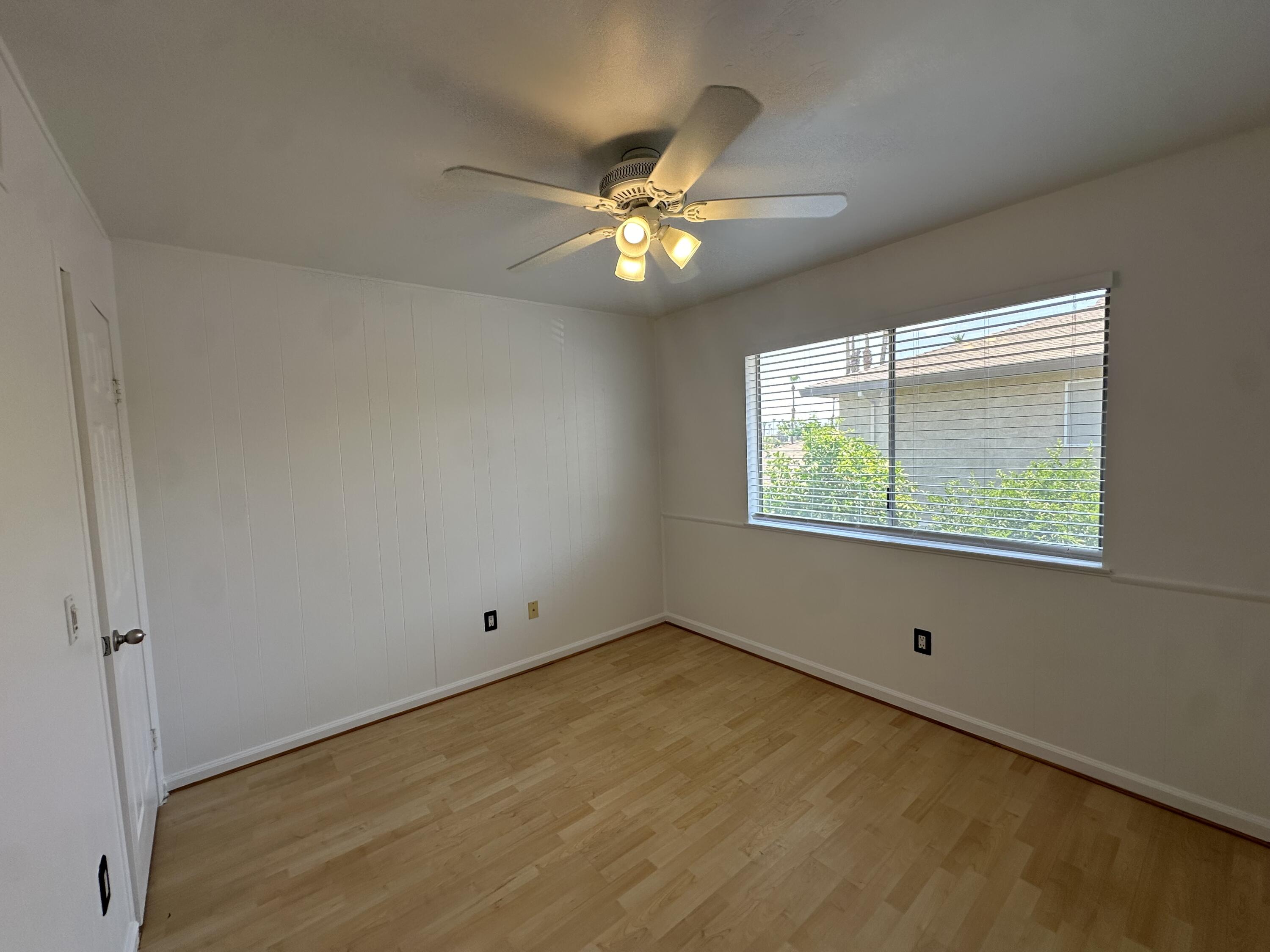 72631 Thrush Road, Unit 2 Palm Desert, CA 92260 - Photo 11 of 20 a view of an empty room with a window